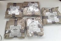 Five packaged brown fleece microfiber towels labeled Digital Prints