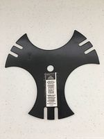 Full view of tri-cut blade front showing design and label