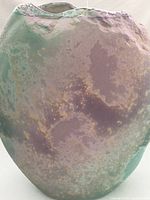 Front view showing pastel raku glaze and texture