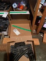 Box containing multiple curved O27 gauge track switches