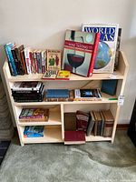 Front view of full bookshelf showing shelves and dimensions reference
