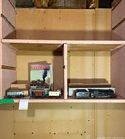 Overall shelf view showing book and HO scale trains