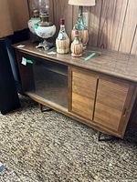 Full view of credenza showing glass and wood sliding doors