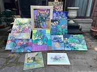 Group shot of all thirteen paintings front view