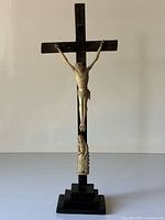 Full view of ebony crucifix with bone figures