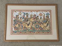 Full view of framed textile painting