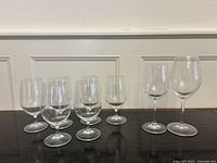 All eight Riedel wine glasses lined up