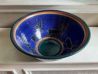 Top view showing moose silhouette design, multicolour rim