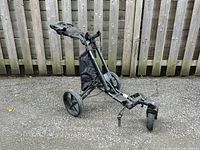 Full view of unfolded pushcart showing frame and wheels