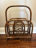 Front view showing full rattan magazine rack structure