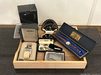 Group shot of all items in wooden tray