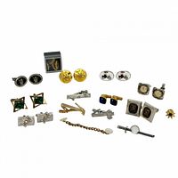 Overview photo showing full assortment of vintage cufflinks and tie clips in various designs, materials and colors
