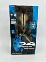 Front view of unopened Independence Day Alien Supreme Commander action figure box showing figure and branding.
