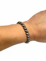 Braclet on wrist showing size and design details