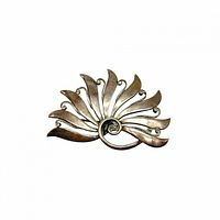 Front view of vintage vintage sterling silver brooch with a natural, leaf or floral shape, showing curved segments and spiral center.