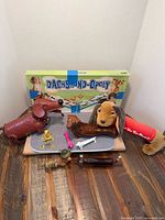 Full lot overview showing board game, plush, figures, pens