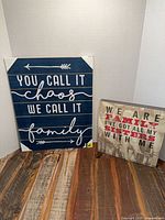 Both wall hangings standing on floor for scale