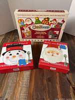 Front view of all three boxed items