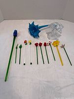 All 13 glass flowers arranged to show variety and size