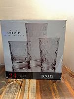 Front of sealed box showing product images and branding