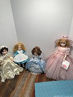 Group shot of all four Madame Alexander dolls