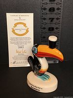 Front view of Royal Doulton Guinness Toucan figurine with certificate