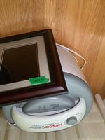 Top view of dehydrator with frame resting on it