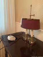 Lamp and timer on table, showing overall lot