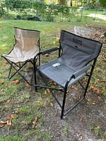 Both folding chairs on lawn, full view
