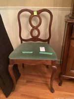 Full view of side chair showing frame, seat upholstery