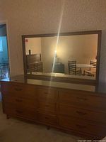 Front view of dresser with mirror attached