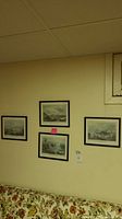 Wall view showing four framed prints arrangement