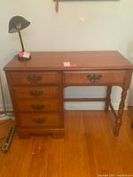 Front view of Kroehler desk showing overall form and finish