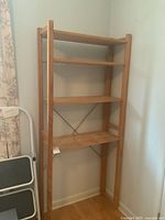 Front view of wooden shelf unit