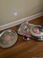 Group view showing both trays, chafing dish, goblets and swan