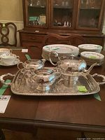 Full view of entire silverplate tea set on tray
