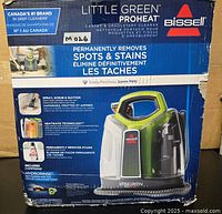 Box showing Bissell Little Green Proheat cleaner with product details