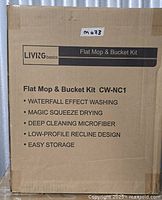 Front of boxed LivingBasics Flat Mop & Bucket Kit showing branding, model and feature list
