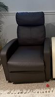 Recliner upright showing overall design and condition