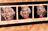 Full view of framed triptych showing three Marilyn Monroe portraits