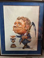 Full view of framed caricature painting with mat and frame