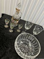 All items together: decanter, three cordial glasses, crystal bowl, two wine glasses