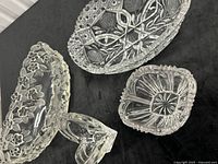 Group shot of three crystal bowls and Mikasa candlestick holder