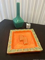 Overall lot: teal vase, orange ashtray, white playing-card suit lighter