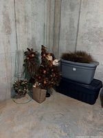 Lot overview with wreaths, swags, tote bins