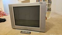 Front view of Sony Trinitron CRT television and remote