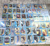 Full layout of A-Team trading cards showing multiple characters and scenes with blue borders and the A-Team logo.