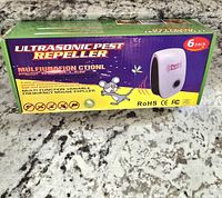 Box showing product brand and features indicating 6 pack of multifunction ultrasonic pest repellers for mice and other pests.
