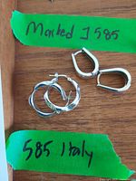 Both earring pairs together, showing 585 Italy marking note