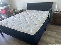 Full view of bed frame and mattress